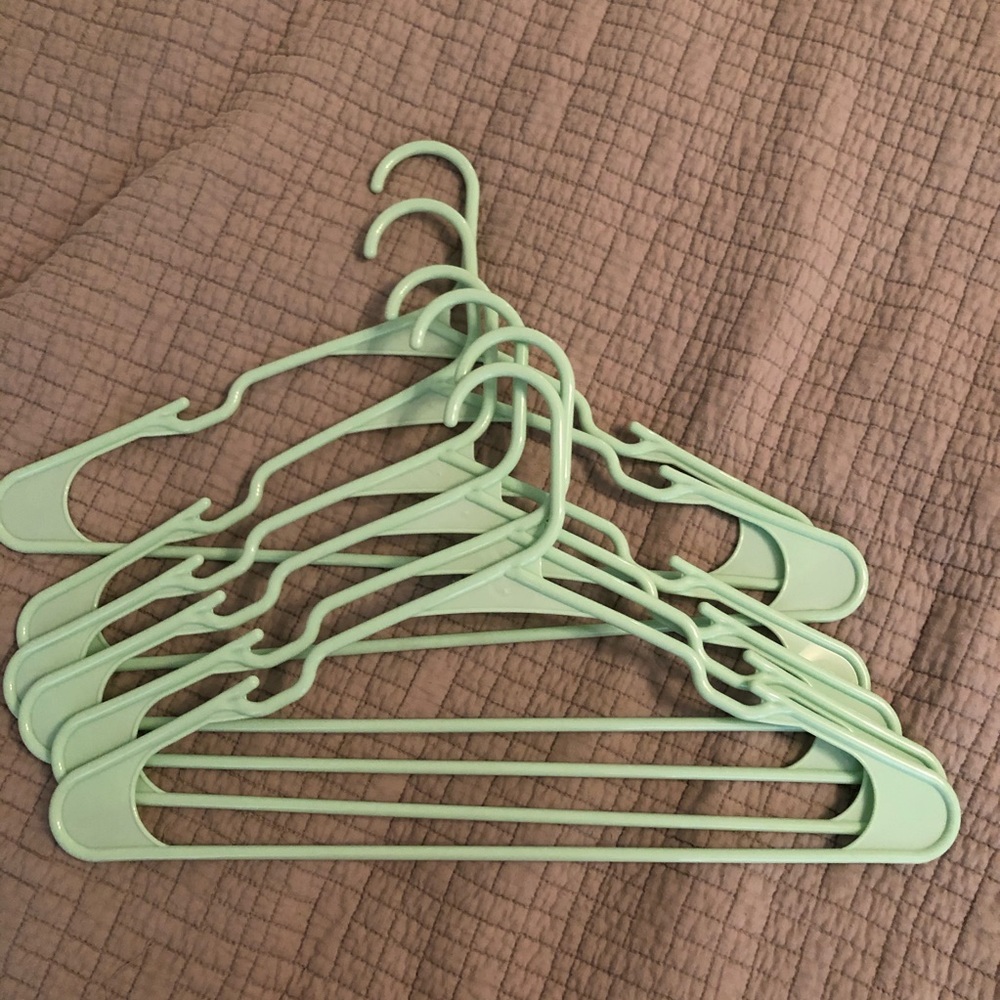 6 light green plastic hangers